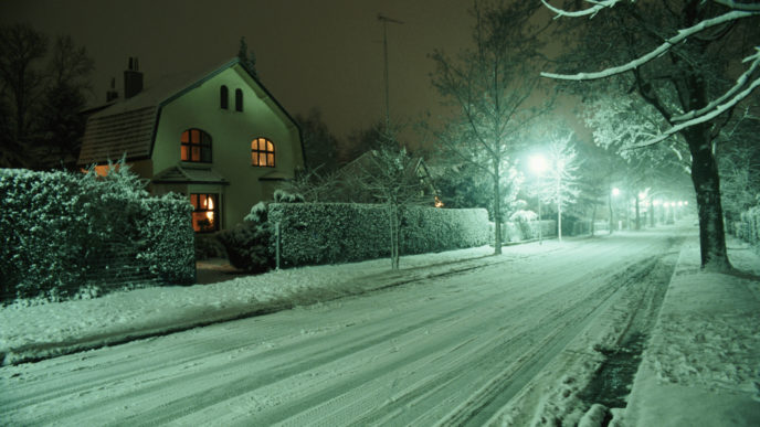 Snow covered street, night