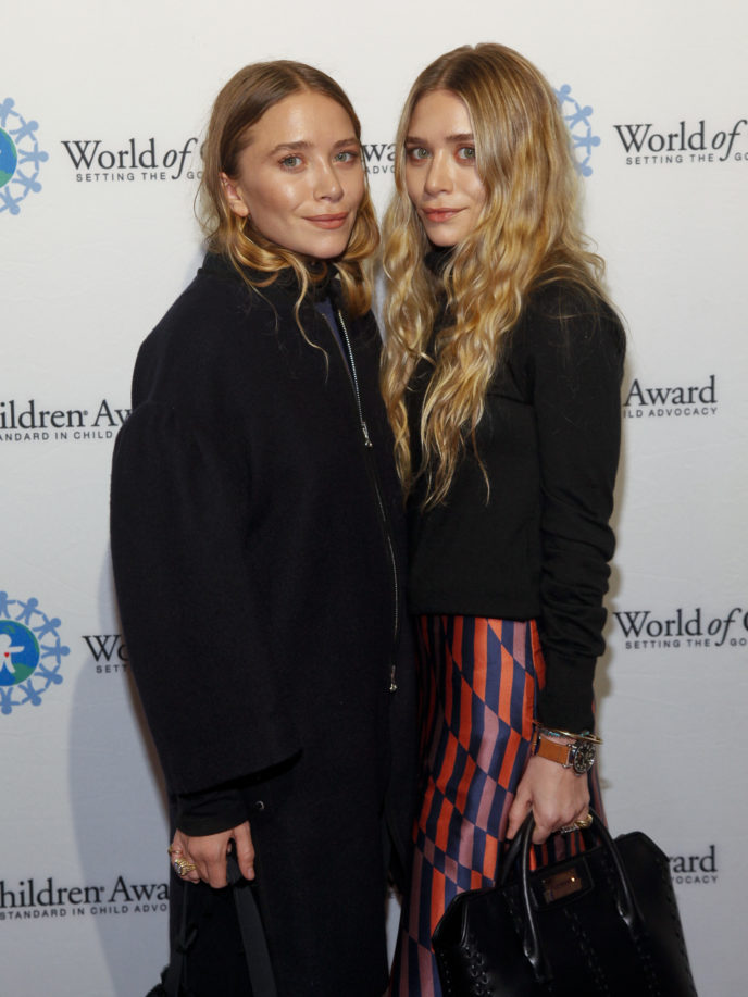 Mary-Kate Olsen, left, and Ashley Olsen, right, attend the 2014 World of Children Awards at 583 Park Avenue on Thursday, Nov. 6, 2014, in New York. (Photo by Andy Kropa/Invision/AP)