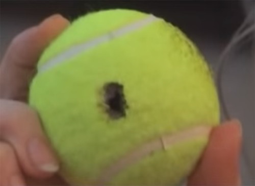 1 ball with hole burned into it.png