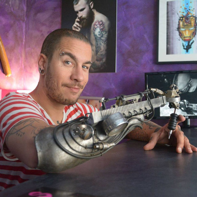 Prosthetic arm tattoo artist jc sheitan tenet jl gonzal 1.jpg