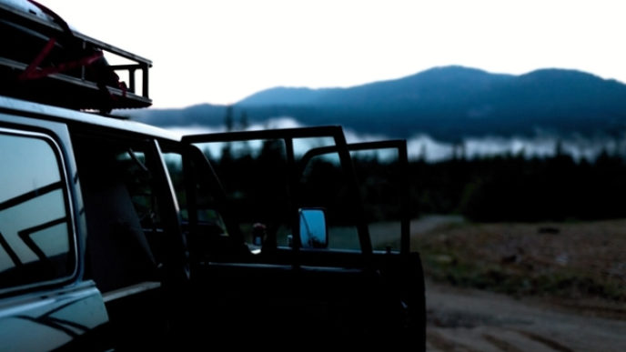 Logging Road Car and Evening Fog