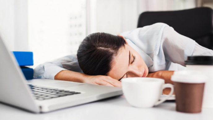 Tired woman in the office