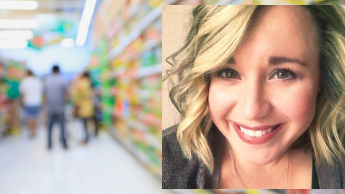 Many different drink bottles on supermarket shelves blurred background