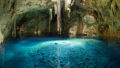 Sinkhole in Mexico with dangling vines