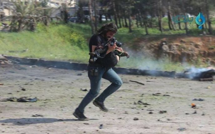 Photographer tries save boy syrian bus attack 1 58f7046b800c3__700.jpg