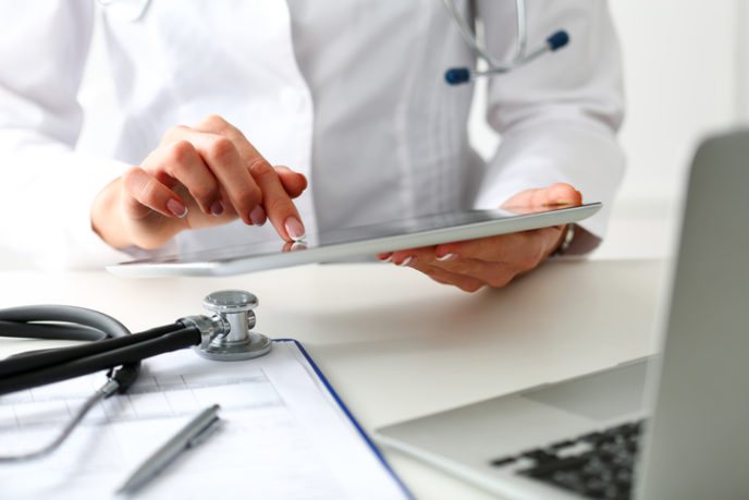 Female doctor hold digital tablet pc
