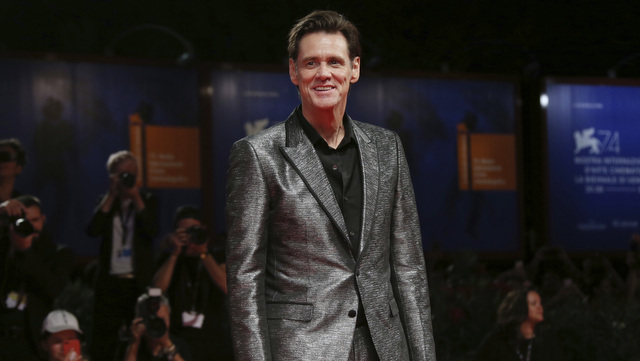 Actor Jim Carrey poses for photographers at the premiere of the film &#039;Jim and Andy: The Great Beyond&#039; at the 74th edition of the Venice Film Festival in Venice, Italy, Tuesday, Sept. 5, 2017. (Photo by Joel Ryan/Invision/AP)