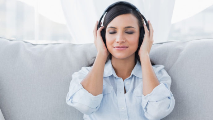 Pretty brunette listening to music