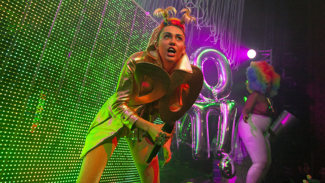 FILE - In this Thursday, Nov. 19, 2015 file photo, Miley Cyrus performs with Miley Cyrus &amp; Her Dead Petz at the Riviera Theatre in Chicago. The top 10 songs of the year according to Associated Press music editor Mesfin Fekadu, includes Cyrus&#039; “Pablow the Blowfish.&quot; (Photo by Barry Brecheisen/Invision/AP, File)