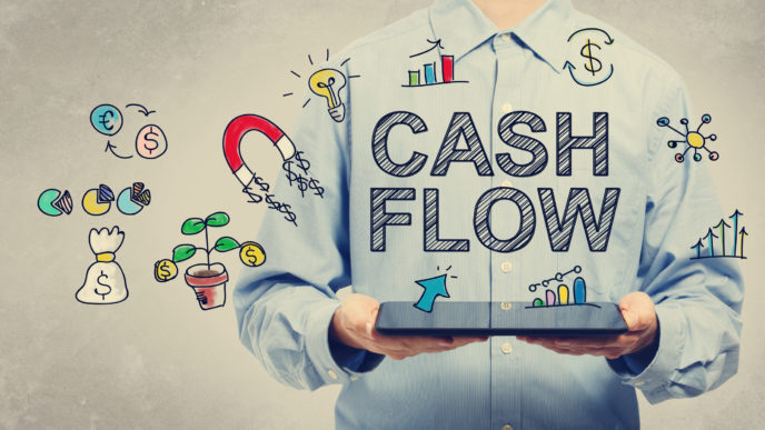 Cash Flow concept with young man holding a tablet