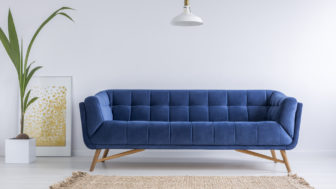 Blue,Sofa,And,Wicker,Carpet,In,White,Simple,Living,Room