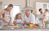 Big,Family,,Cooking,And,Vegetables,With,A,Child,Helping,Mother