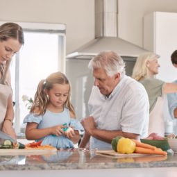 Big,Family,,Cooking,And,Vegetables,With,A,Child,Helping,Mother