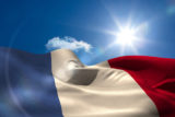 French national flag under sunny sky
