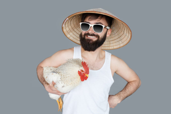 Crazy man holding a cock going to vacation