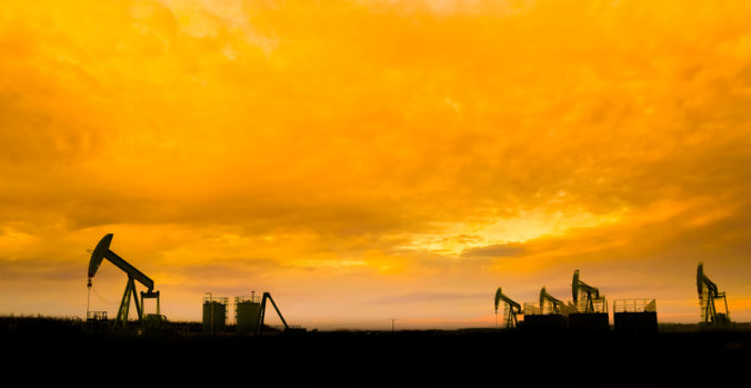 Silhouette of Oil pumps at oil field