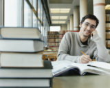 Portrait of a Student Studying in a Library