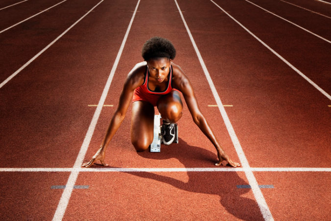 Athletic woman preparing for race