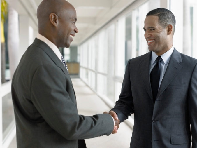 Happy Businessmen Shaking Hands