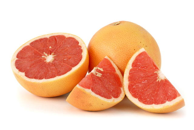 Citrus_paradisi_grapefruit_pink_white_bg.jpg