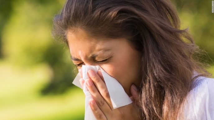 140331140601 sneezing woman horizontal large gallery.jpg