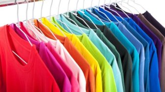 Variety of casual shirts on hangers