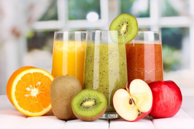Bigstock fresh fruit juices on wooden t 54817562 840x560.jpg