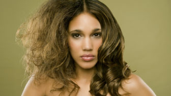 Young woman with two different hair styles, portrait, close up