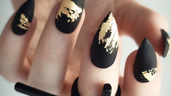 Gold foil gorgeous nails black matte base.jpg