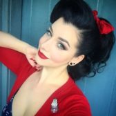 8 pin up ponytail with a red bow.jpg