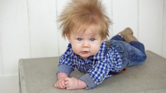 Pay hairy baby with five inch quiff.jpg