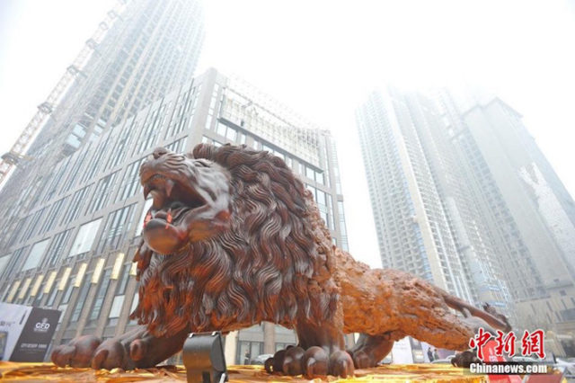 Giant lion sculpture fortune plaza times square.jpg