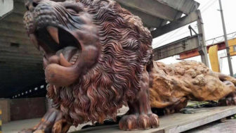 Giant lion sculpture redwood trunk.jpeg