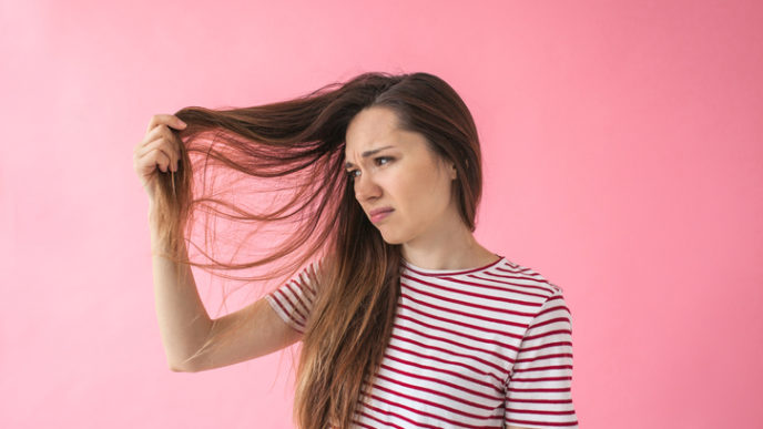 The girl is not happy with her hair