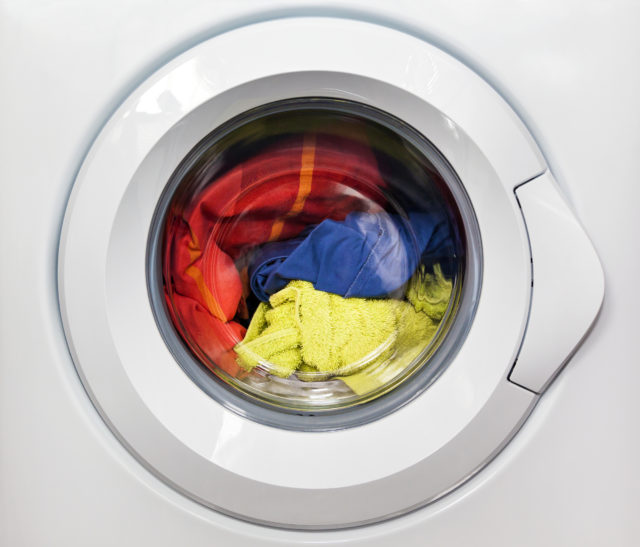Washing machine with dirty clothes inside