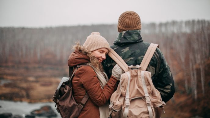 A,Loving,Couple,In,Autumn,Stand,On,A,Mountain,Overlooking