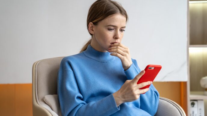 žena s mobilom