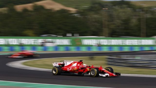 347917_sebastian vettel kimi raikonne 640x420.jpg