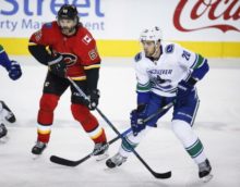 357888_canucks_flames_hockey_70335 1f402aed48de456fbb7dd450f180fc45 676x527.jpg