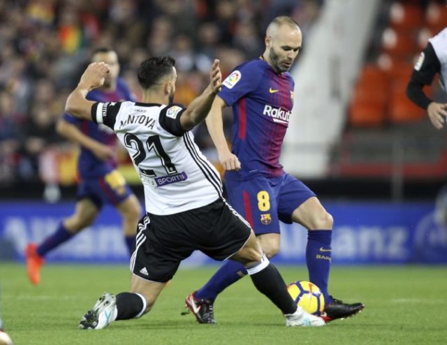 359823_martin montoya andres iniesta 676x522.jpg