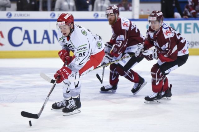 362935_switzerland_hockey_spengler_cup_78243 361b278ff23f41d5828bf271f8febb5b 676x450.jpg