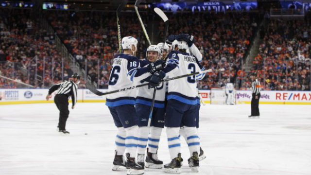 363071_jets_oilers_hockey_72897 b6474f5b9df7454d8a388249a831f96e 676x460.jpg