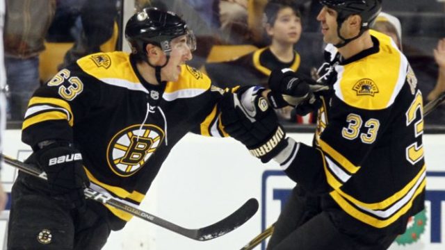 365957_brad marchand 63 zdeno chara 676x487.jpg