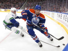 367160_correction_canucks_oilers_hockey 75506fe1310b4a66b43eeb9894133d02 676x504.jpeg