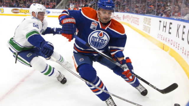 367160_correction_canucks_oilers_hockey 75506fe1310b4a66b43eeb9894133d02 676x504.jpeg