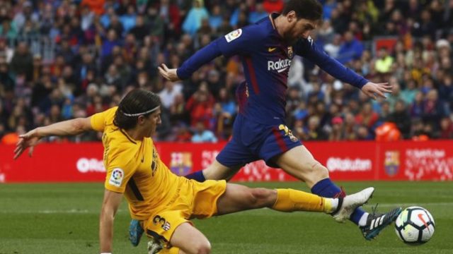 369097_filipe luis lionel messi 676x460.jpg