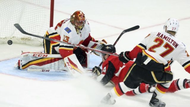 369590_jean gabriel pageau 44 dougie hamilton david rittich 676x440.jpg