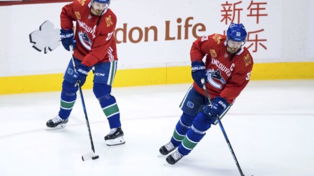 371473_daniel sedin henrik sedin 676x449.jpg