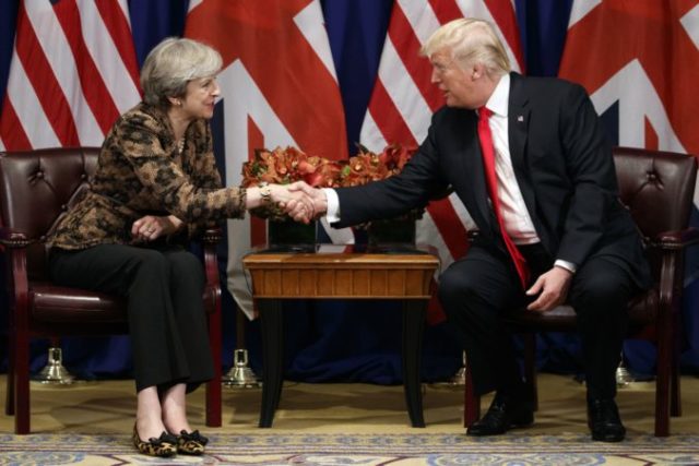 372433_theresa mayova donald trump 676x451.jpg