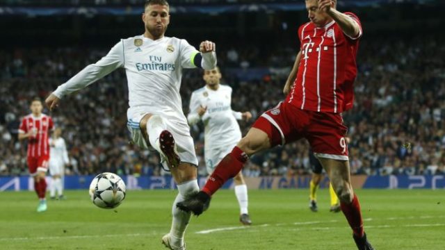 374142_sergio ramos robert lewandowski 676x463.jpg
